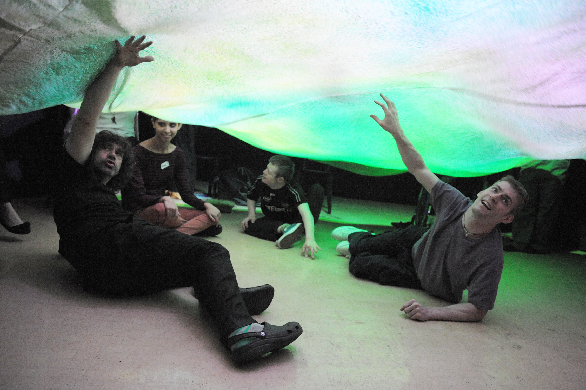 Interacting with a tree canopy: development work on White Peacock, produced by Nottingham Playhouse, with our potential audience members. Performers Matt Marks on the left and Dan Edge on the right.